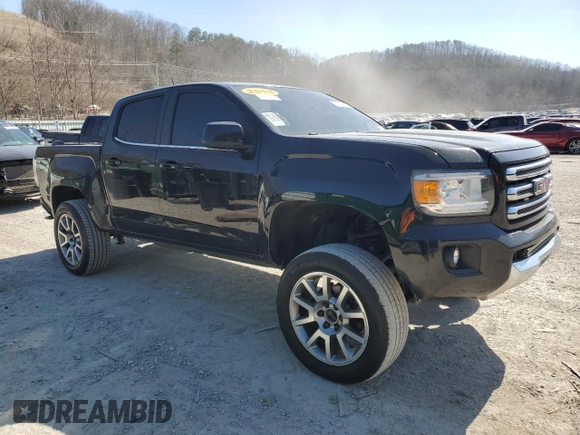 2015 GMC Canyon 4WD SLE with VIN 1GTG6BE36F1265777, listed as a Copart auction lot 48534175 with 207,939 mi miles and Clean Title. Bid and sale history available at carsss.com. Image 4.
