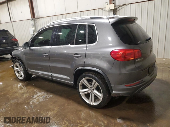 2016 Volkswagen Tiguan R-Line with VIN WVGBV7AX4GW085961, listed as a Copart auction lot 41828715 with 102,369 mi miles and Salvage Title. Bid and sale history available at DreamBid. Image 2.