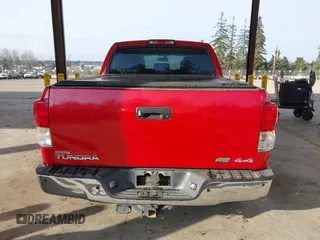 2012 Toyota Tundra 4WD Truck LTD with VIN 5TFHW5F13CX268552, listed as a IAAI auction lot 41461707 with 199,502 mi miles. Bid and sale history available at carsss.com. Image 16.