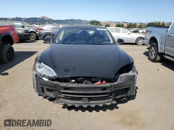 2014 Tesla Model S 60 z VIN 5YJSA1S19EFP56100, wystawiony jako Copart lot #62331725 z przebiegiem Nie podano mil oraz Szkoda całkowita • Salvage title. Historia ofert i sprzedaży dostępna na DreamBid. Obrazek 5.
