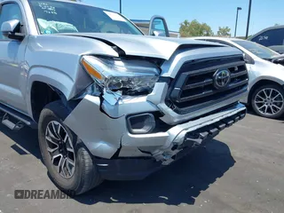 2022 Toyota Tacoma SR with VIN 3TYAX5GN4NT037625, listed as a IAAI auction lot 42382411 with 49,703 mi miles and . Bid and sale history available at DreamBid. Image 6.