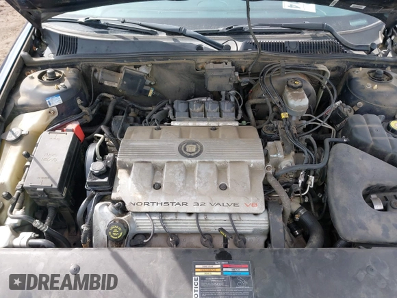1999 Cadillac Seville Touring STS z VIN 1G6KY5493XU913994, wystawiony jako IAAI lot #41780695 z przebiegiem 60 375 mil mil oraz . Historia ofert i sprzedaży dostępna na DreamBid. Obrazek 10.