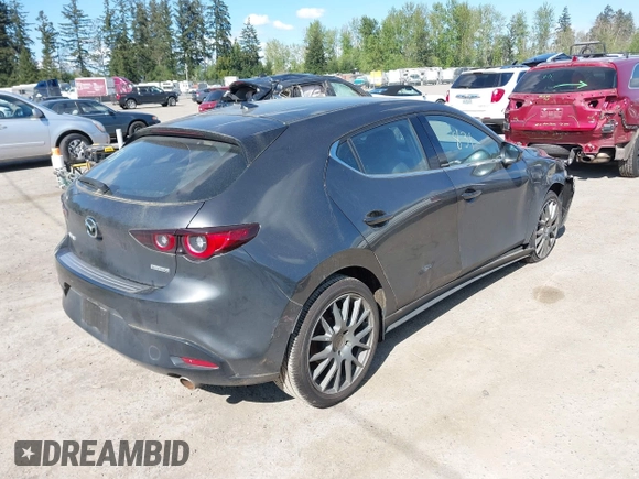 2022 Mazda Mazda3 Hatchback Premium with VIN JM1BPAML9N1518186, listed as a IAAI auction lot 42074112 with 23,722 mi miles. Bid and sale history available at carsss.com. Image 4.