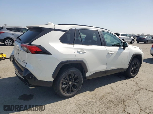 2022 Toyota RAV4 Hybrid SE with VIN 2T3T6RFV8NW034399, listed as a Copart auction lot 60249015 with 39,495 mi miles and Salvage title. Bid and sale history available at DreamBid. Image 3.