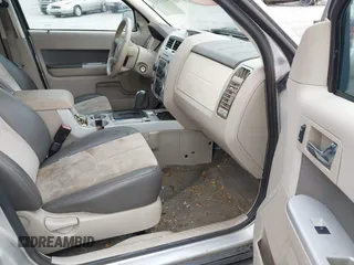 2009 Mercury Mariner Premier z VIN 4M2CU87G59KJ25154, wystawiony jako IAAI lot #42050544 z przebiegiem 210 905 mil mil oraz . Historia ofert i sprzedaży dostępna na DreamBid. Obrazek 5.