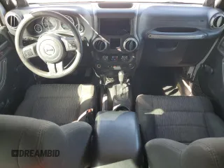 2012 Jeep Wrangler Sport z VIN 1C4AJWAG3CL151885, wystawiony jako Copart lot #51682175 z przebiegiem 111 544 mil mil oraz Szkoda całkowita • Salvage title. Historia ofert i sprzedaży dostępna na DreamBid. Obrazek 8.