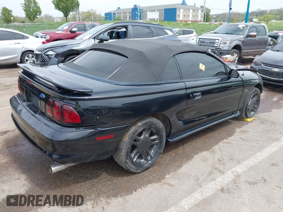 1996 Ford Mustang GT with VIN 1FALP45X0TF133385, listed as a IAAI auction lot 42060901 with 205,228 mi miles and . Bid and sale history available at DreamBid. Image 4.