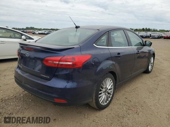 2017 Ford Focus Titanium with VIN 1FADP3J27HL298402, listed as a Copart auction lot 57340875 with 110,172 mi miles and Salvage title. Bid and sale history available at DreamBid. Image 3.