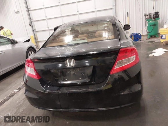 2012 Honda Civic Cpe LX with VIN 2HGFG3B55CH559433, listed as a IAAI auction lot 42045526 with 152,159 mi miles. Bid and sale history available at carsss.com. Image 16.