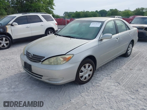 2004 Toyota Camry LE with VIN 4T1BE32K04U286257, listed as a IAAI auction lot 42079619 with 205,634 mi miles. Bid and sale history available at carsss.com. Image 2.