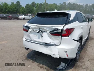 2019 Lexus RX 350 z VIN 2T2BZMCA7KC182763, wystawiony jako IAAI lot #42418779 z przebiegiem 82 254 mil mil oraz . Historia ofert i sprzedaży dostępna na DreamBid. Obrazek 6.