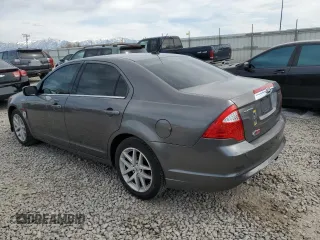 2012 Ford Fusion SEL with VIN 3FAHP0JA6CR282502, listed as a Copart auction lot 50956415 with 148,722 mi miles and Salvage Title. Bid and sale history available at carsss.com. Image 2.