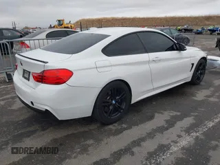 2014 BMW 4 Series 428i xDrive with VIN WBA3N5C56EK196702, listed as a IAAI auction lot 40934482 with 120,292 mi miles. Bid and sale history available at carsss.com. Image 4.