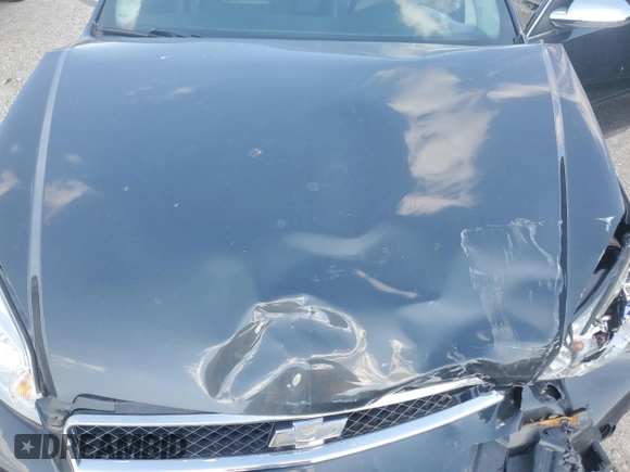 2014 Chevrolet Impala LTZ with VIN 2G1WC5E37E1155067, listed as a Copart auction lot 55255825 with 153,893 mi miles and Salvage title. Bid and sale history available at DreamBid. Image 11.