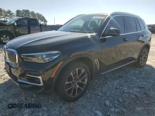 2023 BMW X5 sDrive40i with VIN 5UXCR4C06P9P01409, listed as a Copart auction lot 43127395 with 27,564 mi miles and Salvage Title. Bid and sale history available at carsss.com. Image 1.