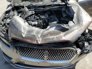 2019 Lincoln MKZ Standard z VIN 3LN6L5A98KR631346, wystawiony jako Copart lot #49717185 z przebiegiem Nie podano mil oraz Nie do naprawy. Historia ofert i sprzedaży dostępna na DreamBid. Obrazek 11.