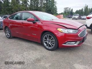 2017 Ford Fusion Hybrid SE with VIN 3FA6P0LU6HR324771, listed as a IAAI auction lot 42612195 with 103,988 mi miles and . Bid and sale history available at DreamBid. Image 1.