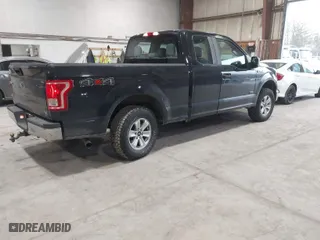 2015 Ford F-150 XLT with VIN 1FTEX1EP4FKE23397, listed as a IAAI auction lot 41665609 with 150,021 mi miles. Bid and sale history available at carsss.com. Image 4.