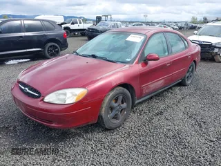 2002 Ford Taurus SE Standard with VIN 1FAFP53U12G199397, listed as a IAAI auction lot 41899248 with 132,419 mi miles and . Bid and sale history available at carsss.com. Image 2.