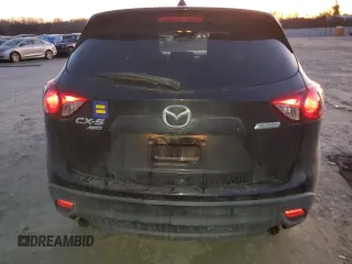 2014 Mazda CX-5 Grand Touring with VIN JM3KE4DY9E0366667, listed as a Copart auction lot 88707365 with 140,115 mi miles and Salvage Title. Bid and sale history available at carsss.com. Image 6.