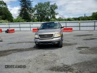 2001 Ford F-150 XLT z VIN 1FTRW08L71KB33686, wystawiony jako Copart lot #58133455 z przebiegiem 248 370 mil mil oraz Szkoda całkowita • Salvage title. Historia ofert i sprzedaży dostępna na DreamBid. Obrazek 13.