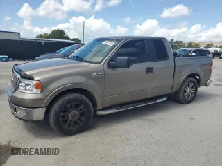 2005 Ford F-150 XLT with VIN 1FTRX12585FA42177, listed as a Copart auction lot 64841645 with 153,779 mi miles and Salvage title. Bid and sale history available at DreamBid. Image 1.