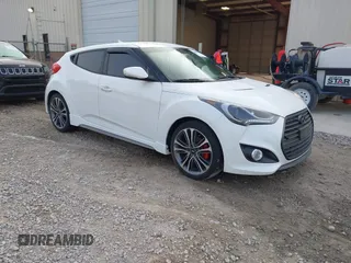 2016 Hyundai Veloster Turbo z VIN KMHTC6AE5GU284757, wystawiony jako IAAI lot #42386059 z przebiegiem 61 966 mil mil oraz . Historia ofert i sprzedaży dostępna na DreamBid. Obrazek 1.