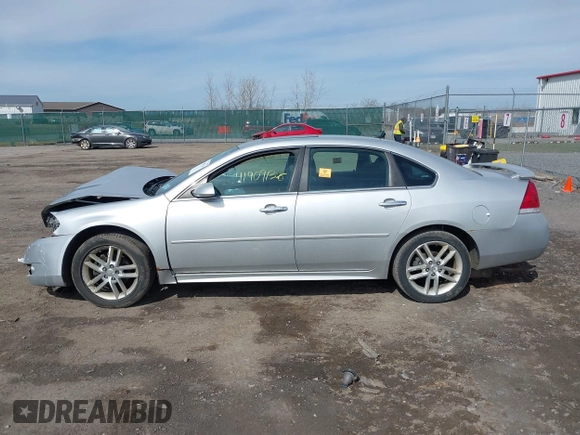 2014 Chevrolet Impala LTZ with VIN 2G1WC5E30E1120094, listed as a IAAI auction lot 41909136 with 117,922 mi miles and . Bid and sale history available at DreamBid. Image 14.
