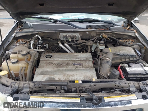 2008 Ford Escape Hybrid with VIN 1FMCU49H38KE50450, listed as a IAAI auction lot 42565336 with Not provided miles and . Bid and sale history available at DreamBid. Image 10.