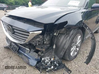 2021 Mazda CX-9 Carbon Edition z VIN JM3TCBDY7M0536005, wystawiony jako IAAI lot #42424129 z przebiegiem 48 005 mil mil oraz . Historia ofert i sprzedaży dostępna na DreamBid. Obrazek 6.