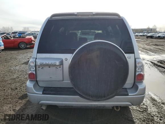 2004 Suzuki XL7 LX z VIN JS3TX92V944100393, wystawiony jako Copart lot #47747495 z przebiegiem 271 000 mil mil oraz Tytuł czysty. Historia ofert i sprzedaży dostępna na DreamBid. Obrazek 6.