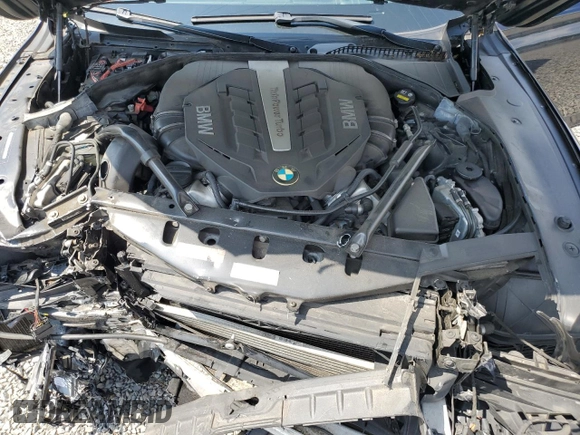 2015 BMW 7 Series 750i xDrive with VIN WBAYB6C58FD966084, listed as a Copart auction lot 61875325 with 159,616 mi miles and Salvage title. Bid and sale history available at DreamBid. Image 11.