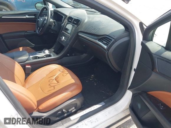 2019 Ford Fusion Titanium with VIN 3FA6P0SU8KR192833, listed as a IAAI auction lot 42818081 with 71,188 mi miles and . Bid and sale history available at DreamBid. Image 5.