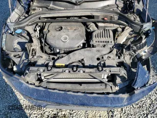 2018 MINI Countryman Cooper S E with VIN WMZYU7C47J3E56451, listed as a Copart auction lot 77193144 with 60,949 mi miles and Salvage Title. Bid and sale history available at carsss.com. Image 11.