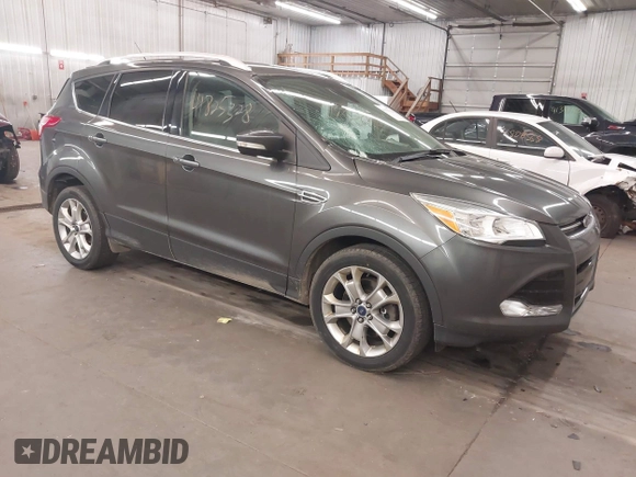 2015 Ford Escape Titanium with VIN 1FMCU9J96FUA43337, listed as a IAAI auction lot 41825328 with 149,639 mi miles and . Bid and sale history available at DreamBid. Image 1.