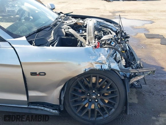 2021 Ford Mustang GT z VIN 1FA6P8CF3M5117977, wystawiony jako IAAI lot #42100989 z przebiegiem 13 557 mil mil oraz . Historia ofert i sprzedaży dostępna na DreamBid. Obrazek 6.