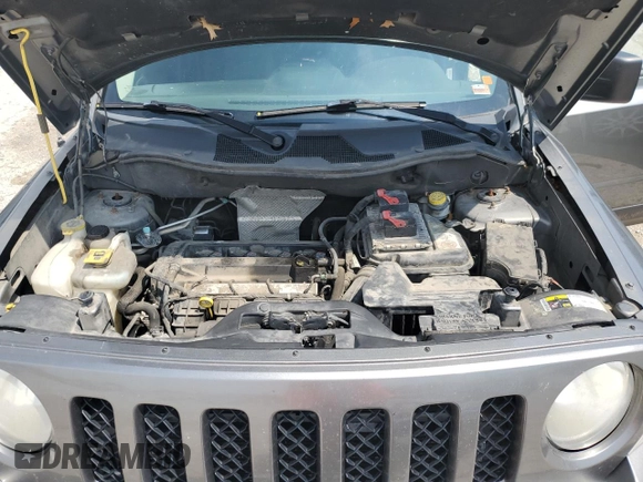 2014 Jeep Patriot Altitude z VIN 1C4NJPBA1ED523741, wystawiony jako Copart lot #59287135 z przebiegiem 194 757 mil mil oraz Szkoda całkowita • Salvage title. Historia ofert i sprzedaży dostępna na DreamBid. Obrazek 12.