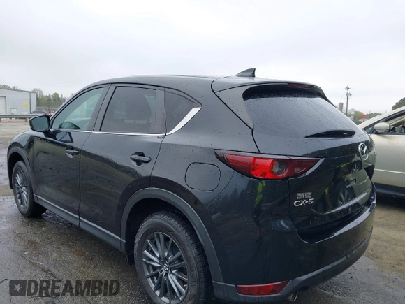 2020 Mazda CX-5 Touring with VIN JM3KFACM9L0770933, listed as a IAAI auction lot 41921464 with 75,997 mi miles. Bid and sale history available at carsss.com. Image 3.