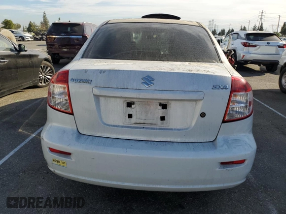 2011 Suzuki SX4 LE with VIN JS2YC5A21B6300207, listed as a Copart auction lot 77040354 with 162,915 mi miles and Salvage Title. Bid and sale history available at carsss.com. Image 6.