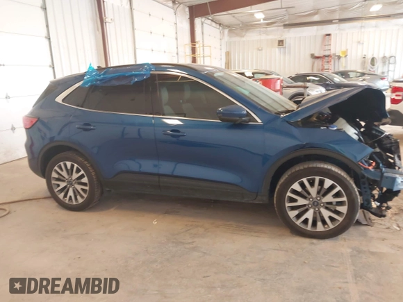 2022 Ford Escape Titanium Hybrid z VIN 1FMCU9DZ9NUA38627, wystawiony jako IAAI lot #42288647 z przebiegiem 54 802 mil mil oraz . Historia ofert i sprzedaży dostępna na DreamBid. Obrazek 13.