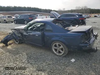 2003 Ford Mustang GT Deluxe with VIN 1FAFP42X23F321777, listed as a Copart auction lot 45707565 with 0 mi miles and Salvage Title. Bid and sale history available at carsss.com. Image 2.
