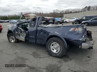 1999 Ford F-150 XL with VIN 1FTRX18L5XNC01963, listed as a Copart auction lot 52508705 with Not provided miles and Salvage title. Bid and sale history available at DreamBid. Image 2.