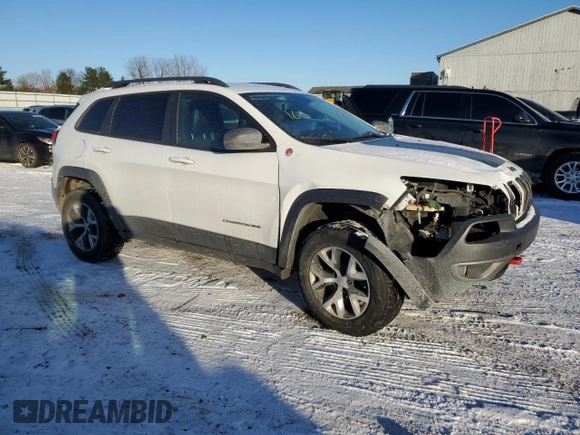 2017 Jeep Cherokee Trailhawk L Plus with VIN 1C4PJMBB1HW510027, listed as a Copart auction lot 82337424 with 144,044 mi miles and Clean Title. Bid and sale history available at carsss.com. Image 4.