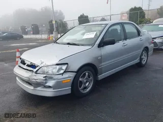 2002 Mitsubishi Lancer OZ-Rally with VIN JA3AJ86E92U038601, listed as a IAAI auction lot 41025991 with 162,450 mi miles. Bid and sale history available at carsss.com. Image 2.