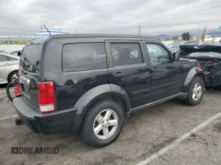2008 Dodge Nitro SLT with VIN 1D8GT58K78W117240, listed as a Copart auction lot 82433244 with 245,392 mi miles and Salvage Title. Bid and sale history available at DreamBid. Image 3.