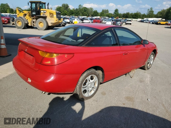 2001 Saturn SC z VIN 1G8ZY127X1Z116460, wystawiony jako Copart lot #67962944 z przebiegiem 93 372 mil mil oraz Nie do naprawy. Historia ofert i sprzedaży dostępna na DreamBid. Obrazek 3.