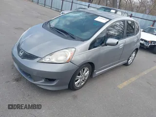 2009 Honda Fit Sport with VIN JHMGE884X9S045470, listed as a IAAI auction lot 41993638 with 181,198 mi miles. Bid and sale history available at carsss.com. Image 2.