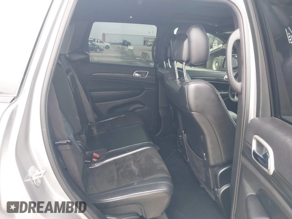 2019 Jeep Grand Cherokee Laredo E with VIN 1C4RJFAG9KC670974, listed as a IAAI auction lot 42333028 with 163,958 mi miles and . Bid and sale history available at DreamBid. Image 8.