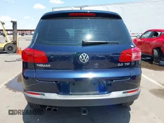 2013 Volkswagen Tiguan with VIN WVGCV3AX6DW605876, listed as a IAAI auction lot 42431619 with 106,279 mi miles and . Bid and sale history available at DreamBid. Image 16.