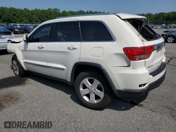 2011 Jeep Grand Cherokee Laredo with VIN 1J4RR4GG6BC657520, listed as a Copart auction lot 63558355 with 215,444 mi miles and Salvage title. Bid and sale history available at DreamBid. Image 2.